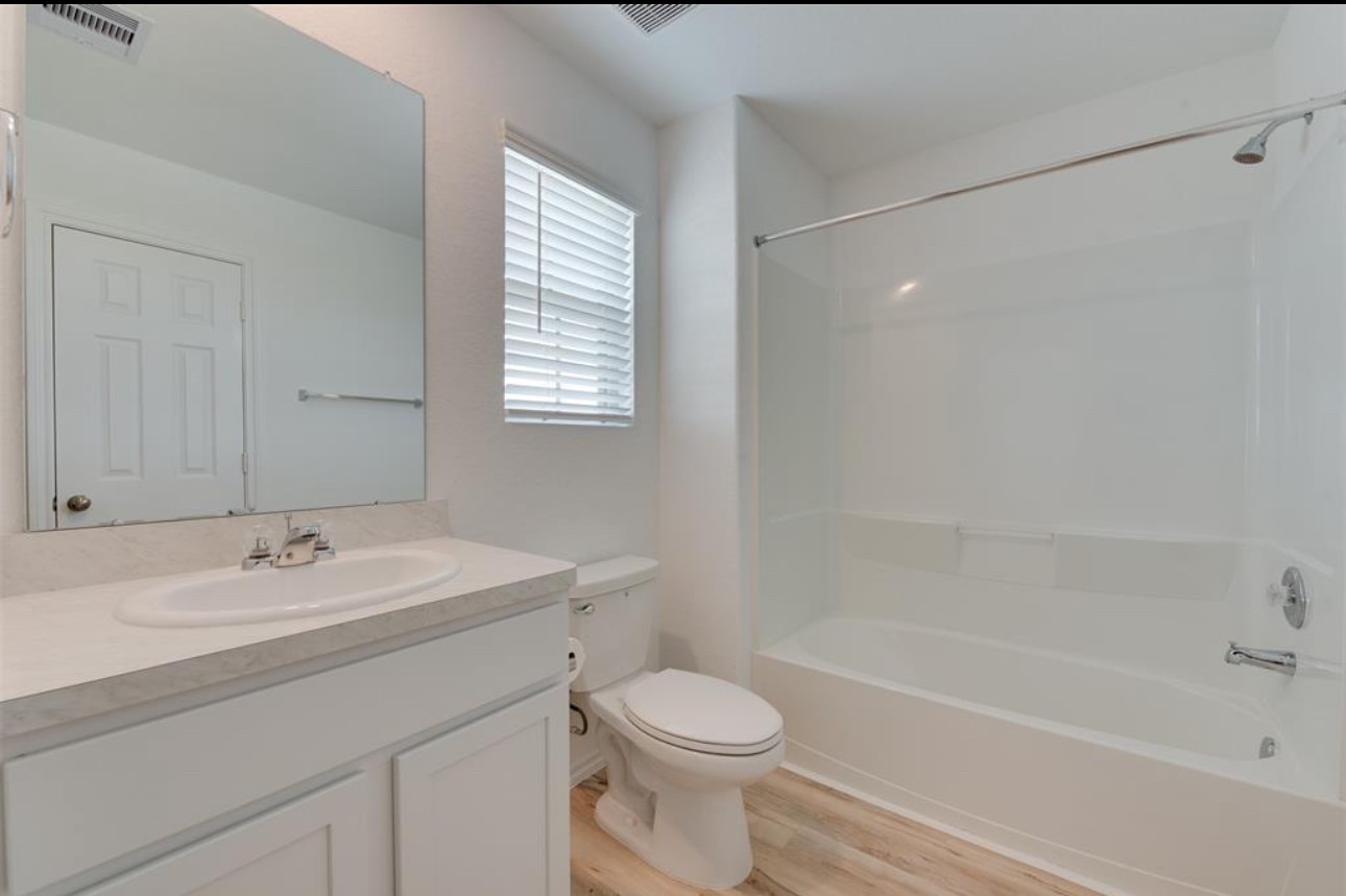 11020 South Lake Mist Lane Willis, TX 77318 - Photo 8 of 27 a bathroom with a sink toilet and shower