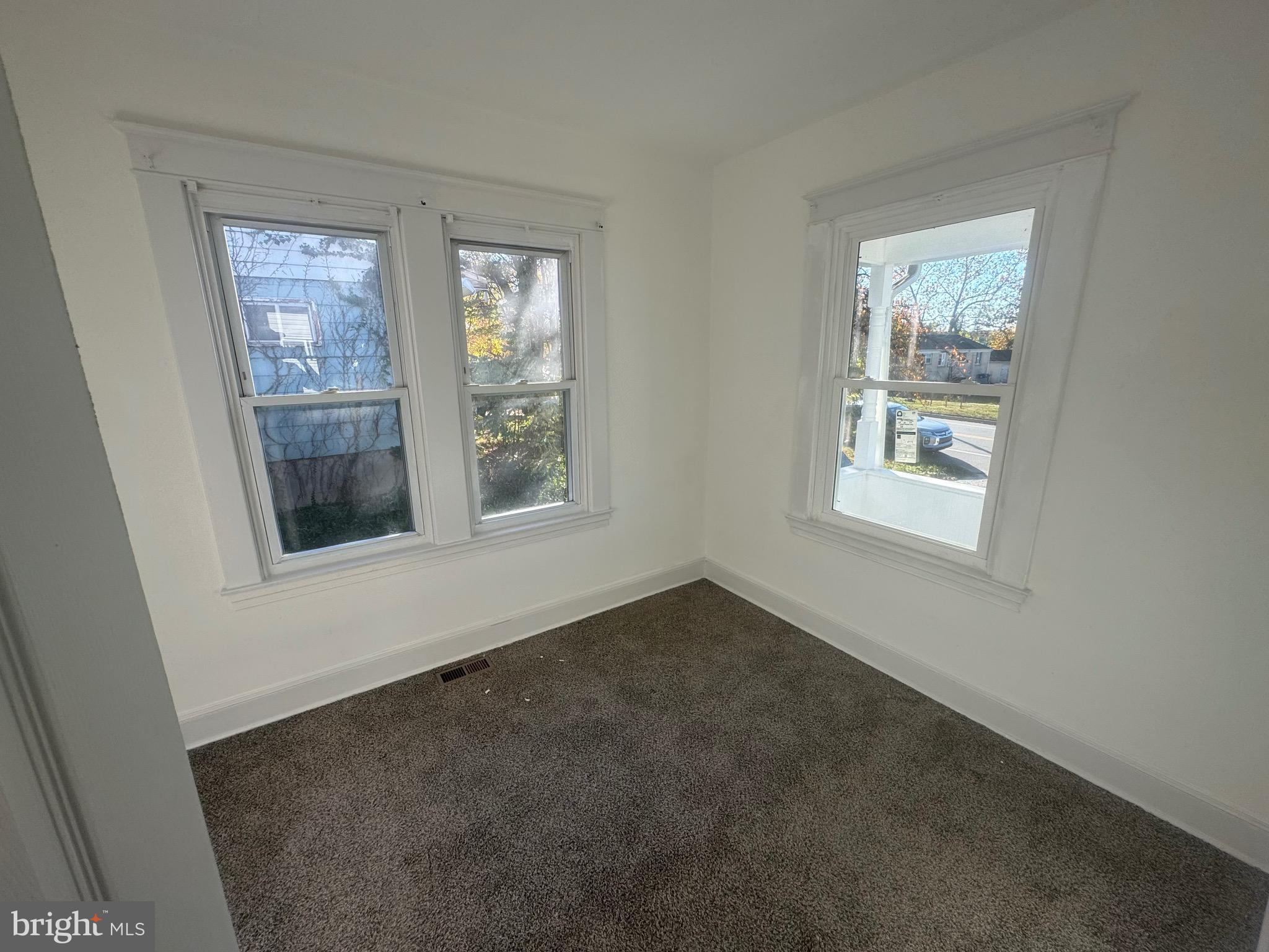 6203 McClean Boulevard Baltimore, MD 21214 - Photo 12 of 26 a view of an empty room with a window