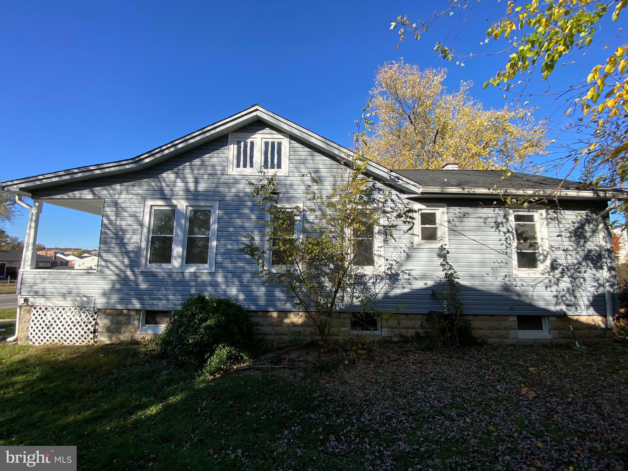 6203 McClean Boulevard Baltimore, MD 21214 - Photo 25 of 26 a view of a house with a yard