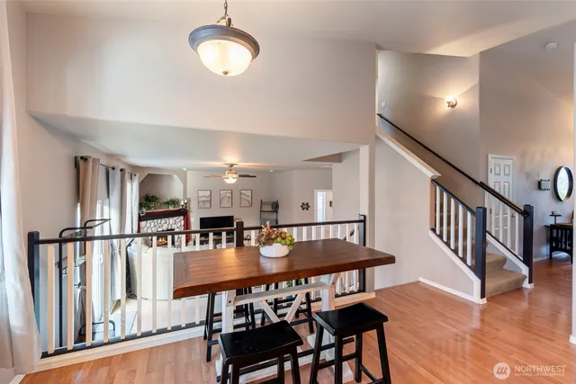a view of kitchen with furniture and wooden floor