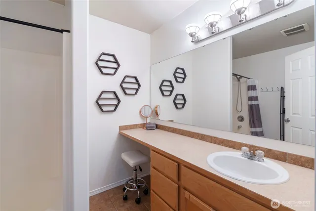 a view of a house with backyard and porch