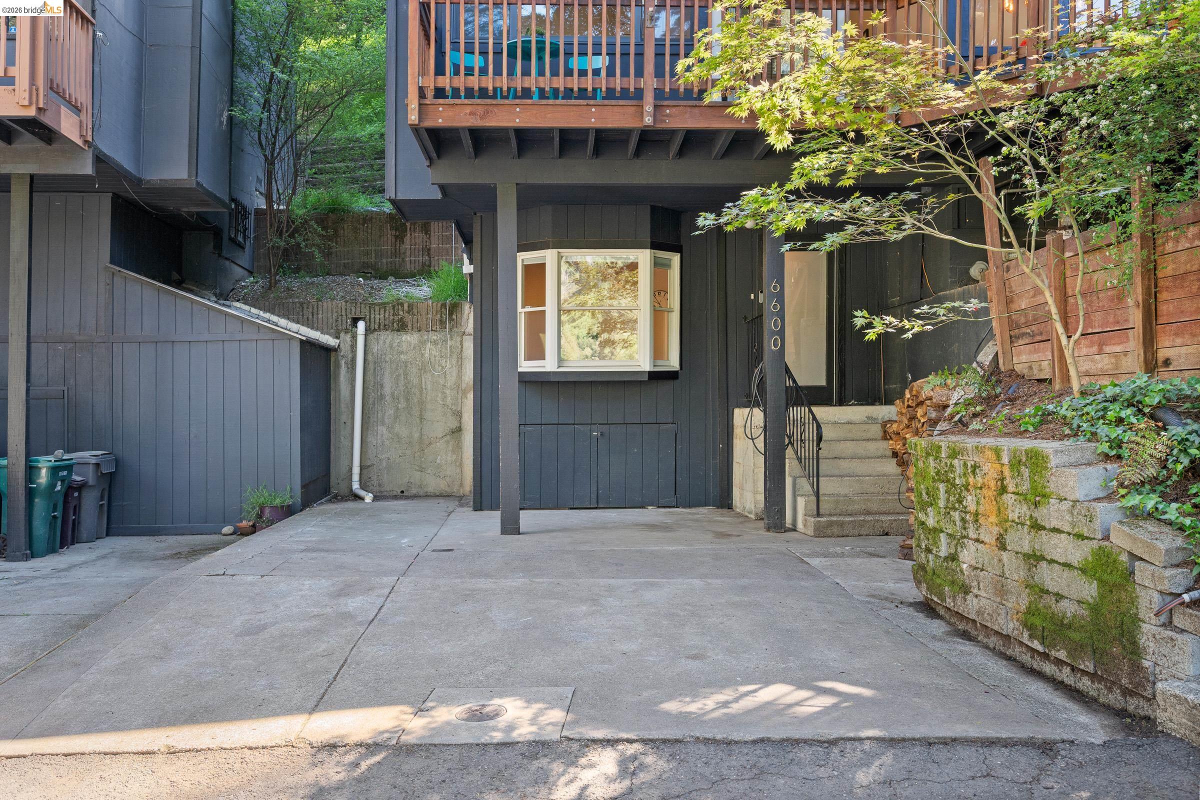 6600 Heather Ridge Way Oakland, CA 94611 - Photo 58 of 66 Concrete driveway providing access to the property entrance