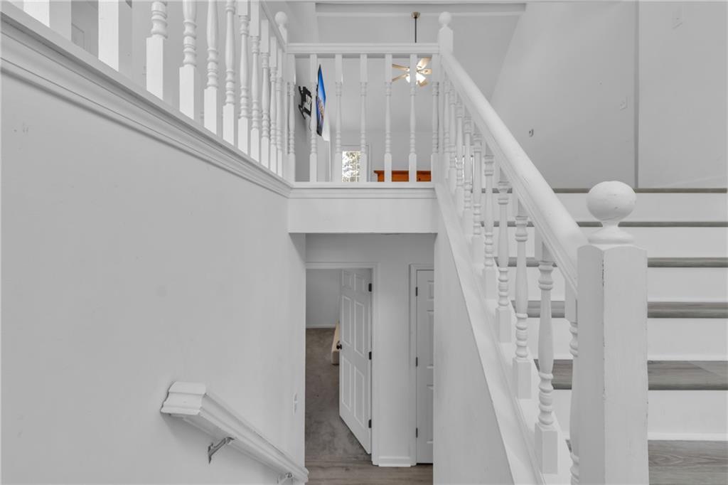 3985 Countryside Way Southwest Snellville, GA 30039 - Photo 27 of 40 a view of staircase with white walls and stairs