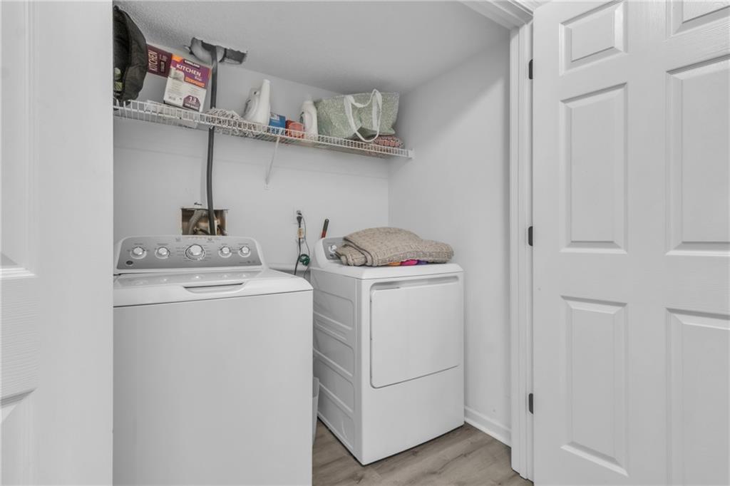 3985 Countryside Way Southwest Snellville, GA 30039 - Photo 32 of 40 a utility room with dryer and washer
