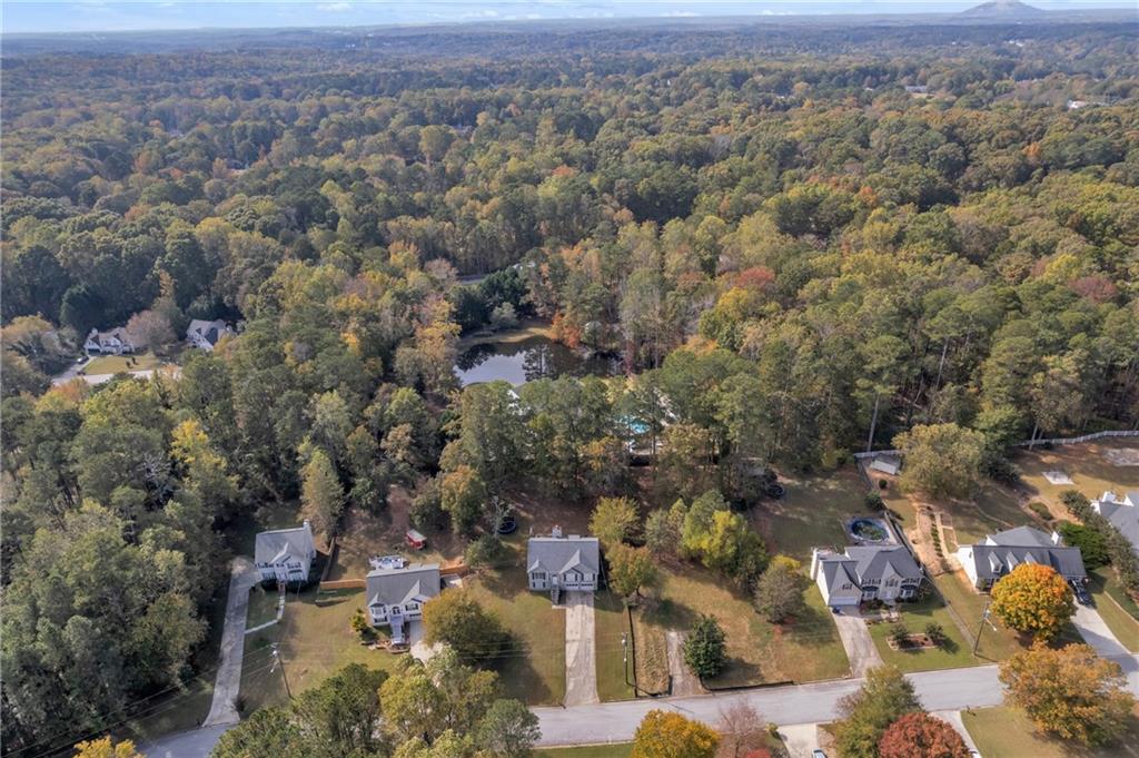 3985 Countryside Way Southwest Snellville, GA 30039 - Photo 34 of 40 an aerial view of residential houses with outdoor space