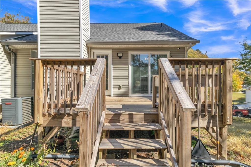 3985 Countryside Way Southwest Snellville, GA 30039 - Photo 38 of 40 a front view of a house with a glass windows