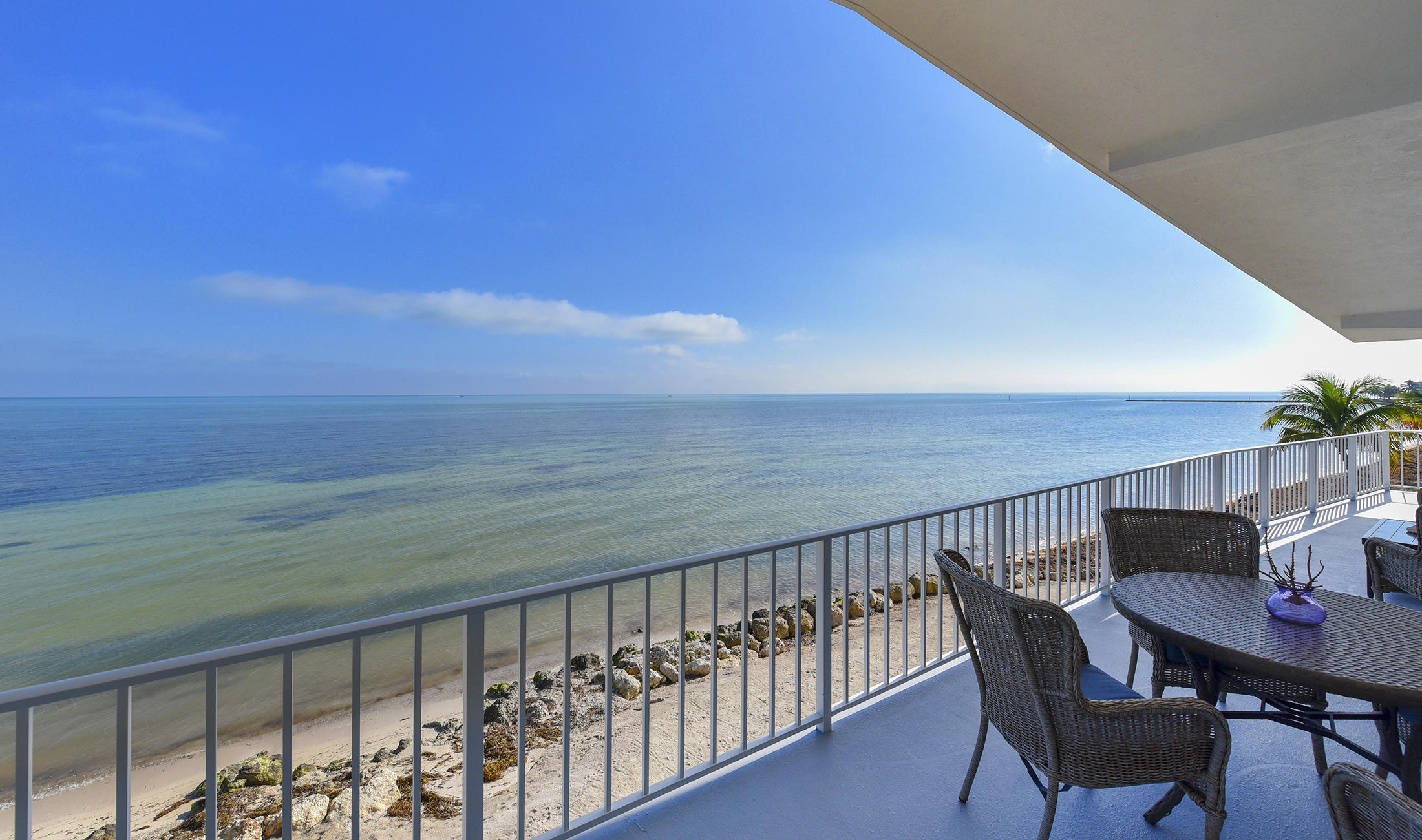 161-154 Sunset Drive Islamorada, FL 33036 - Photo 12 of 38 a view of balcony with furniture
