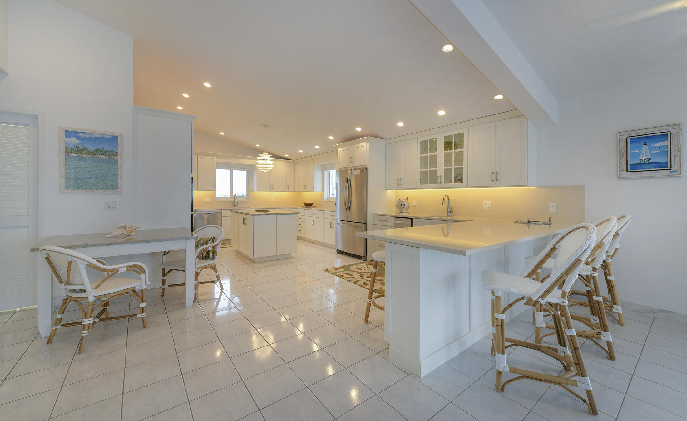161-154 Sunset Drive Islamorada, FL 33036 - Photo 13 of 38 a living room with furniture and kitchen view