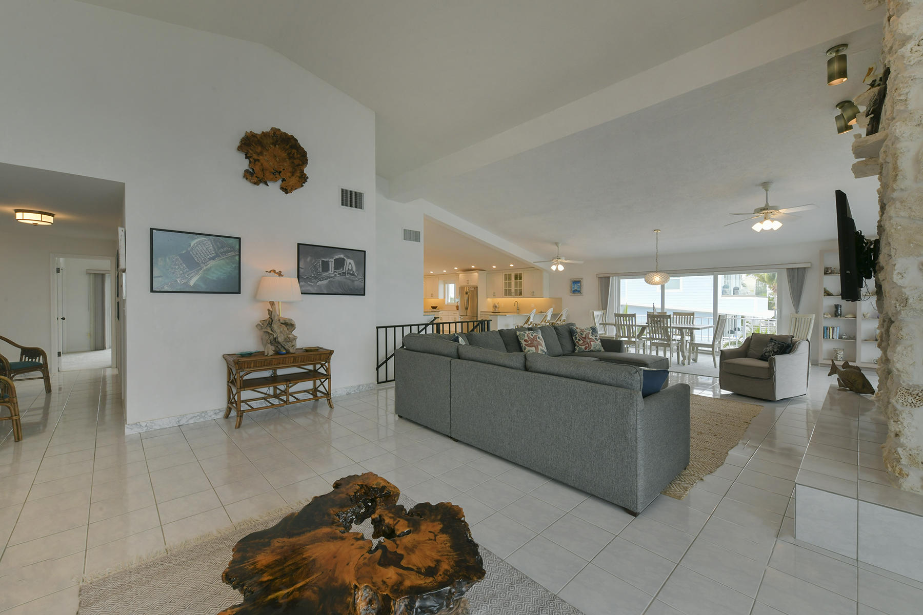 161-154 Sunset Drive Islamorada, FL 33036 - Photo 15 of 38 a living room with furniture and a flat screen tv