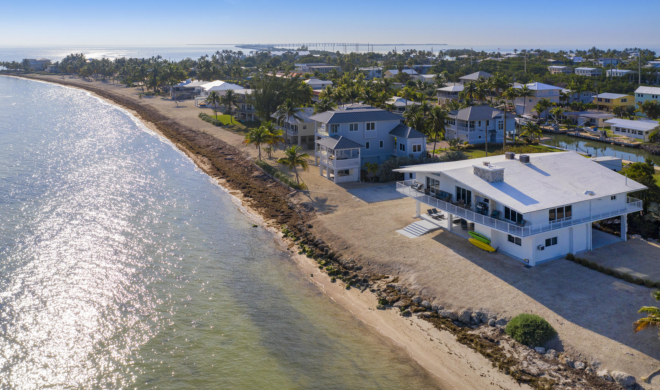161-154 Sunset Drive Islamorada, FL 33036 - Photo 2 of 38 an aerial view of a house with a garden