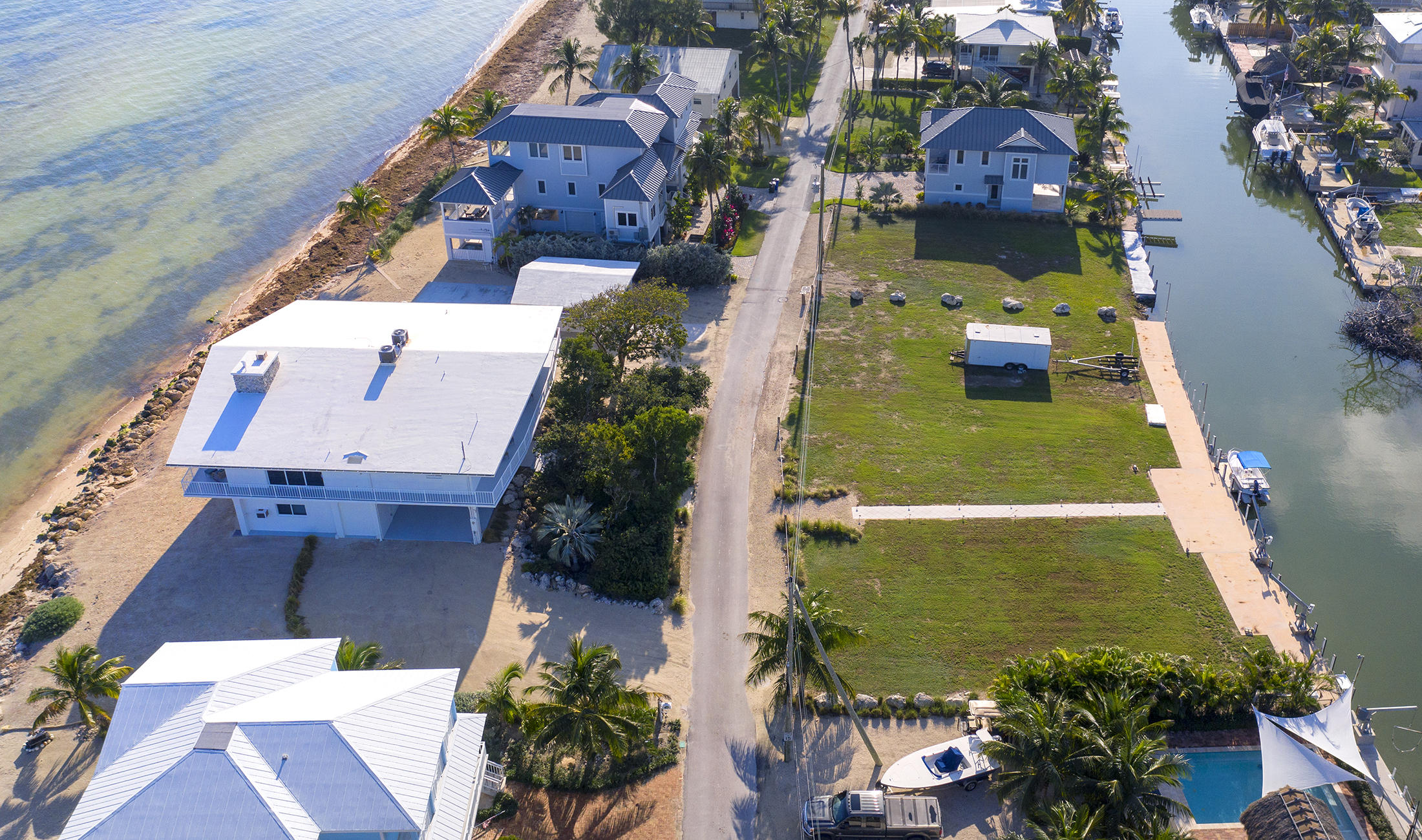161-154 Sunset Drive Islamorada, FL 33036 - Photo 31 of 38 an aerial view of a house with a yard
