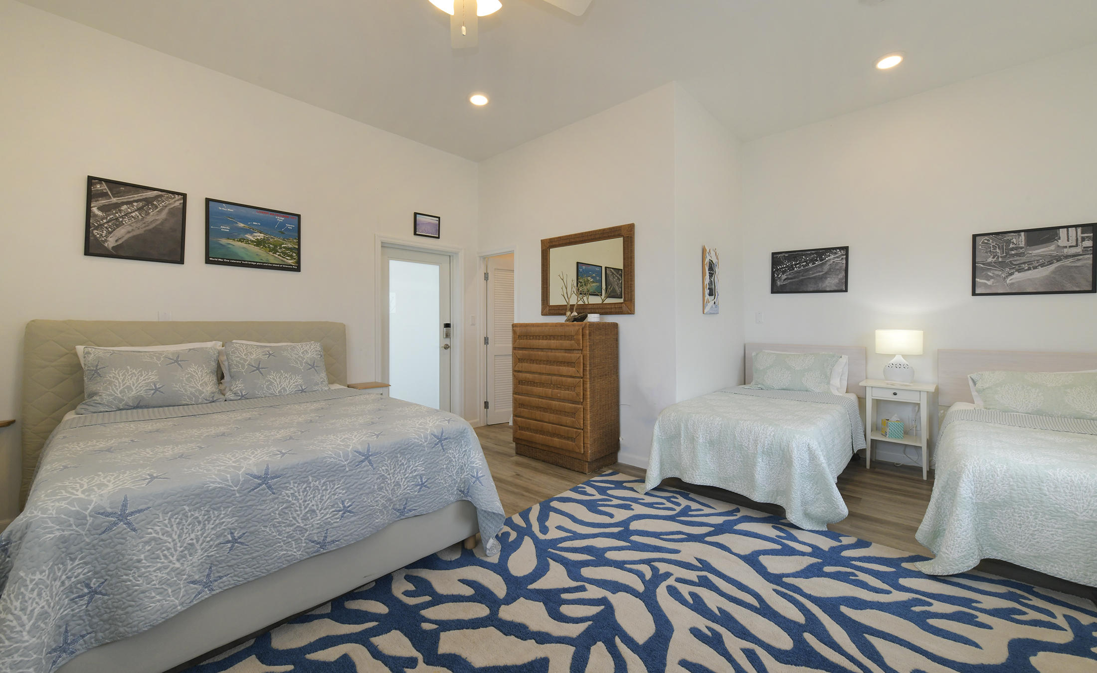 161-154 Sunset Drive Islamorada, FL 33036 - Photo 36 of 38 a bedroom with a bed and a couch