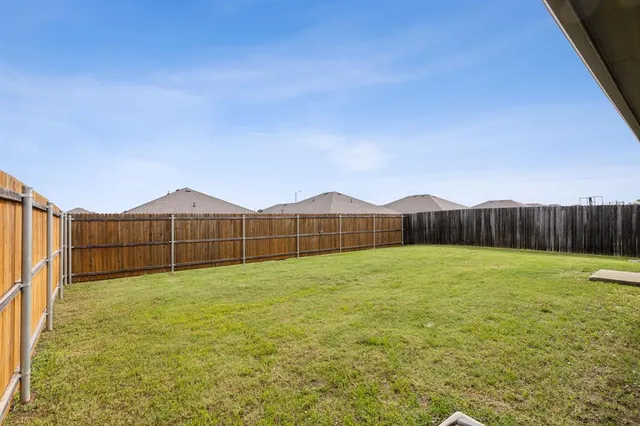 a view of an outdoor space and a yard
