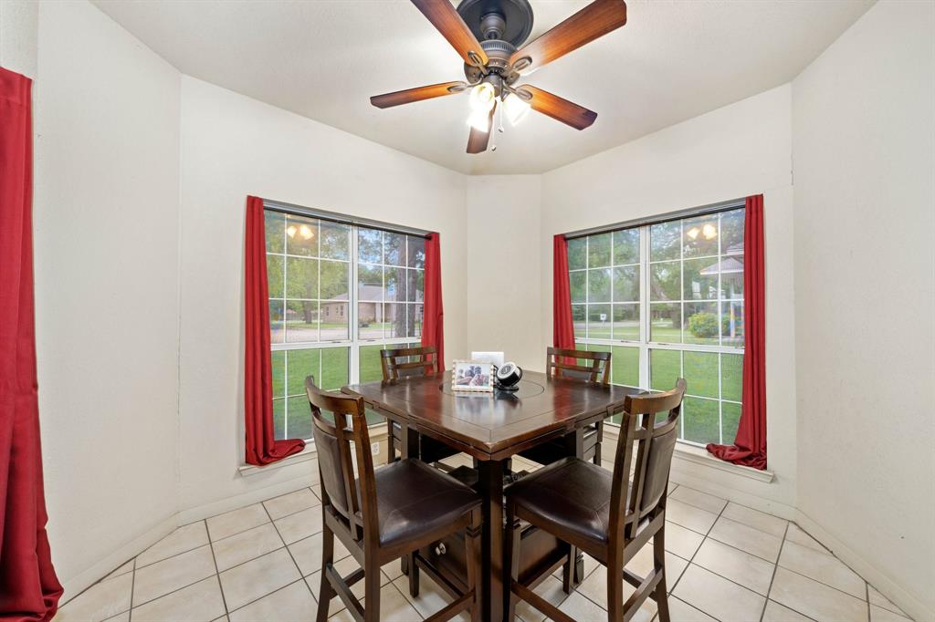 104 Pecan Grove Lancaster, TX 75146 - Photo 17 of 33 a view of a dining room with furniture window and outside view