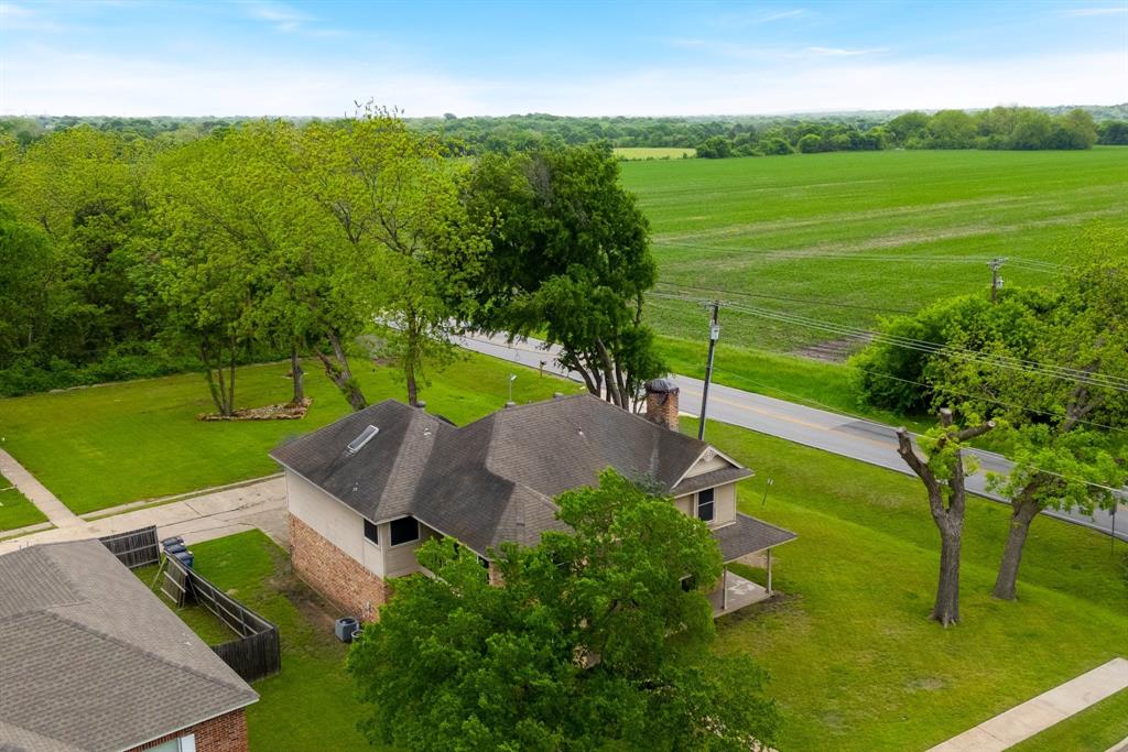 104 Pecan Grove Lancaster, TX 75146 - Photo 9 of 33 an aerial view of a house with a yard