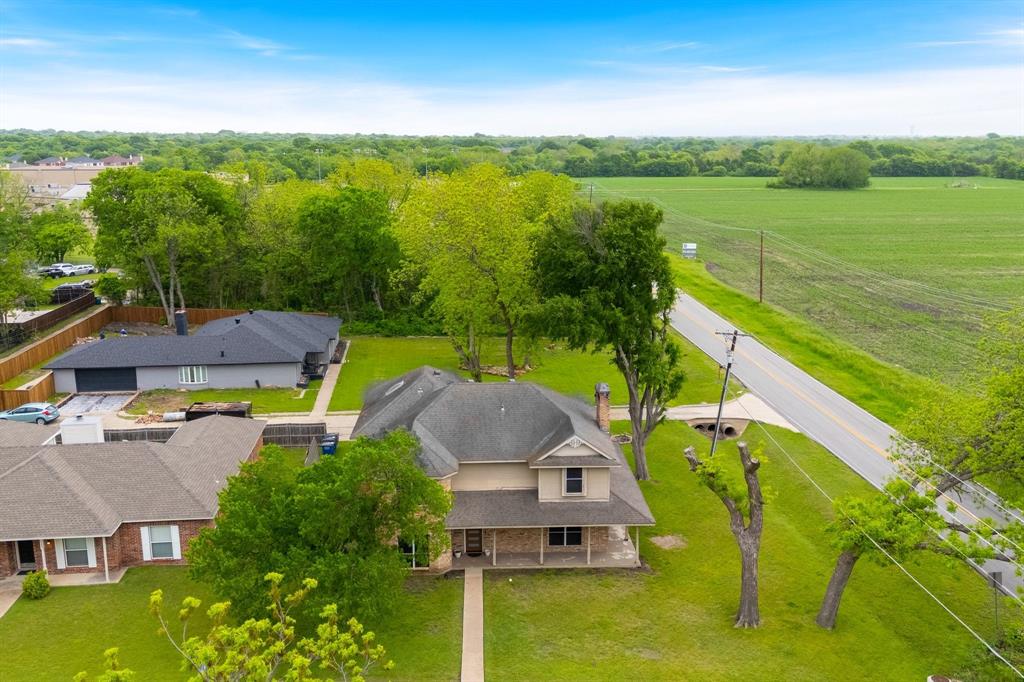 104 Pecan Grove Lancaster, TX 75146 - Photo 10 of 33 a view of house with swimming pool yard and outdoor seating