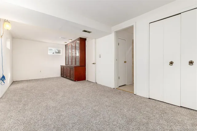a bathroom with a sink toilet and vanity