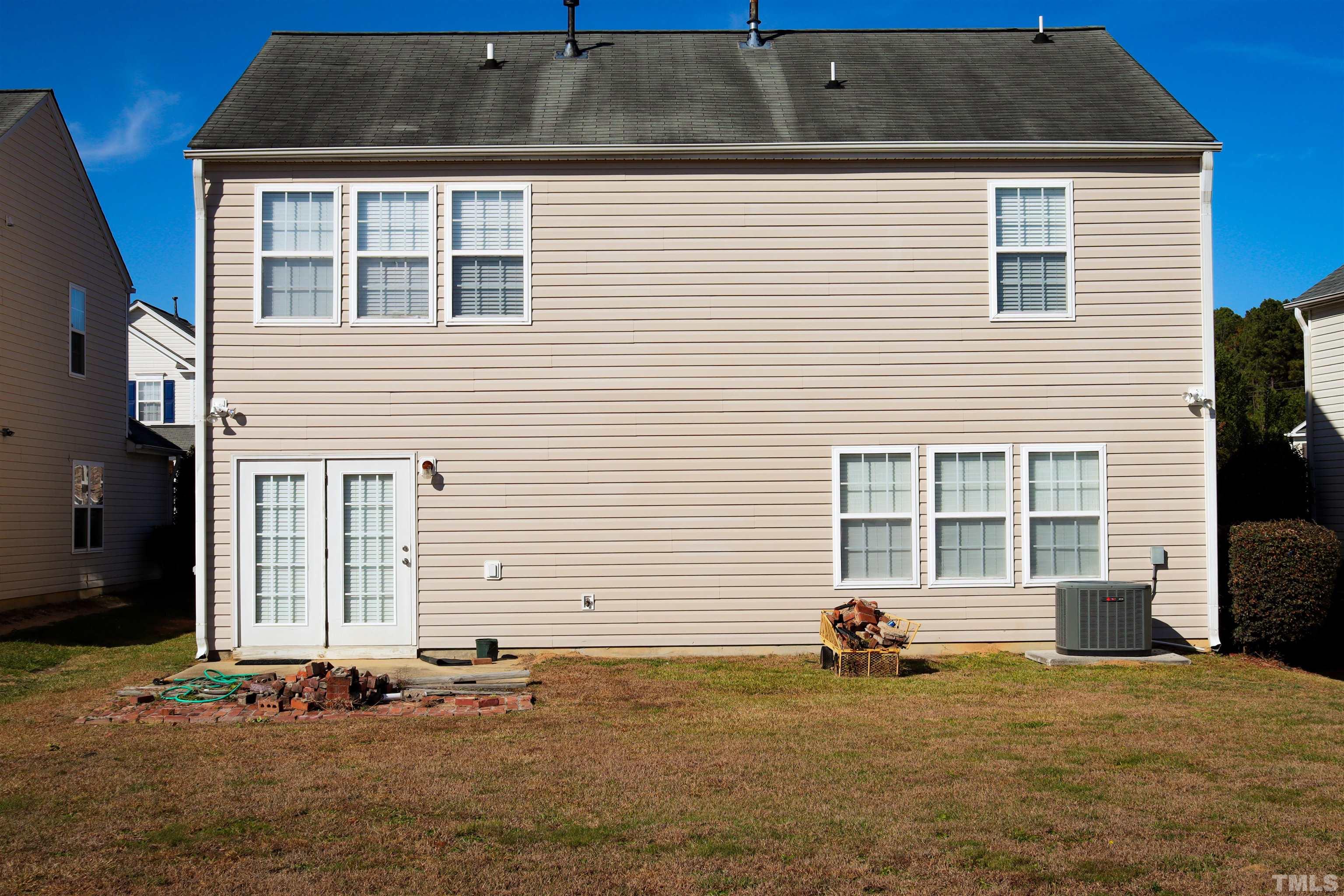 5913 Roteny Court Raleigh, NC 27610 - Photo 3 of 3 a house view with a backyard space