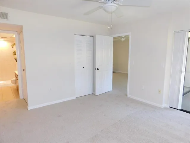 an empty room with a bathroom