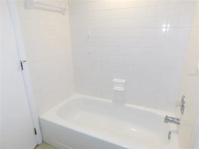 a close up of a bathtub in a bathroom