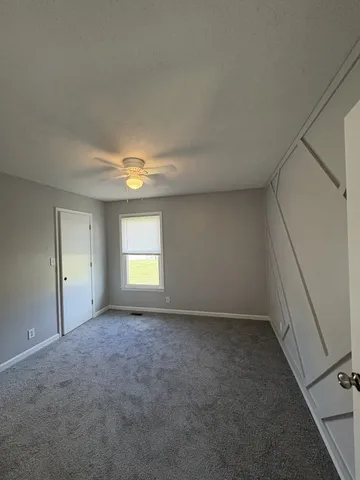 a view of empty room with window