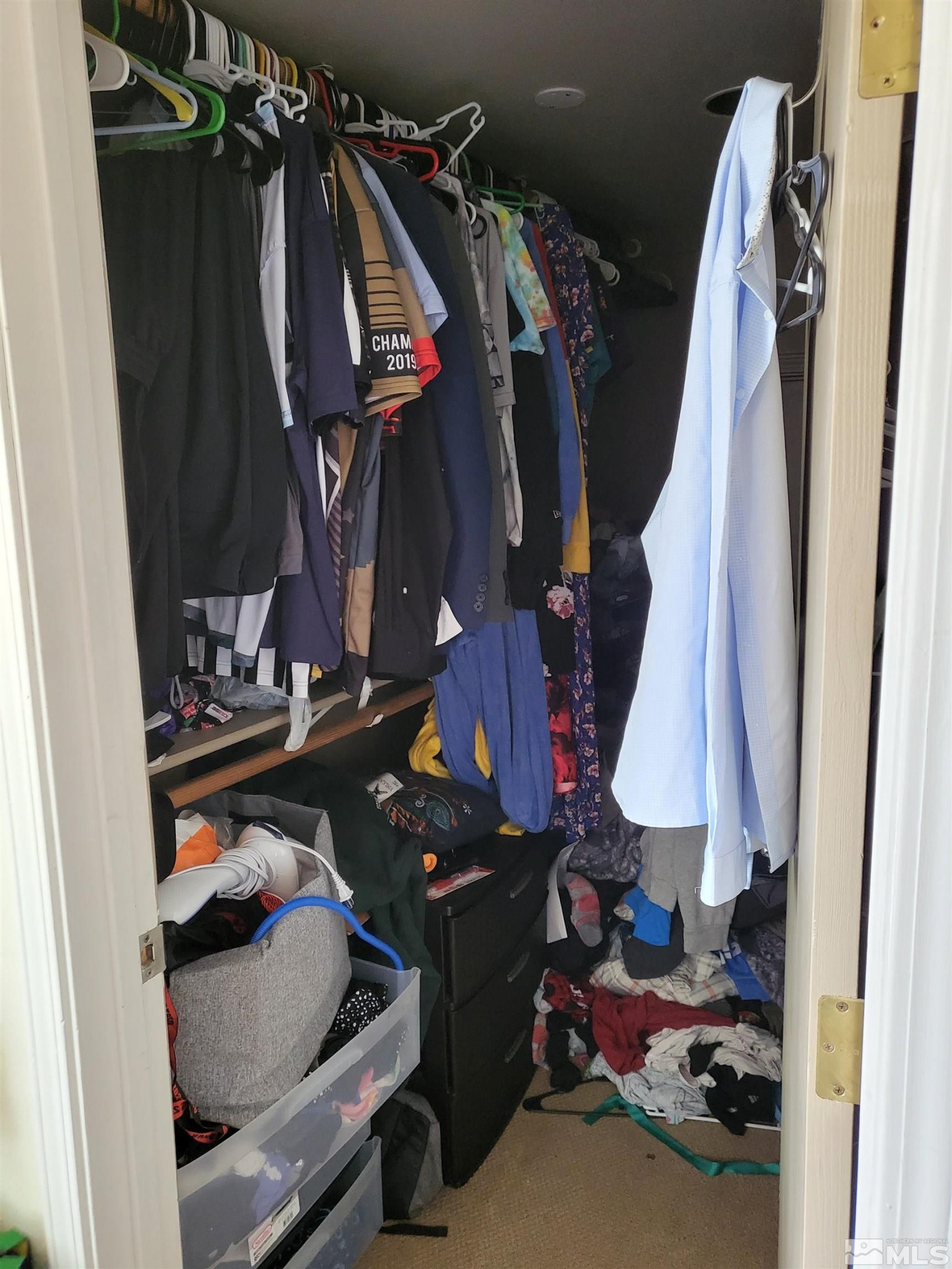 1347 Terrace Drive Reno, NV 89503 - Photo 14 of 25 a view of walk in closet with clothes and shoes