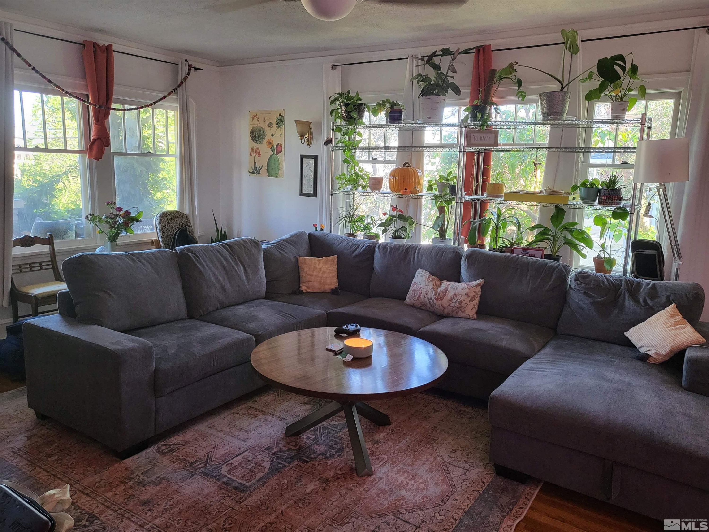 1347 Terrace Drive Reno, NV 89503 - Photo 2 of 25 a living room with furniture and a large window
