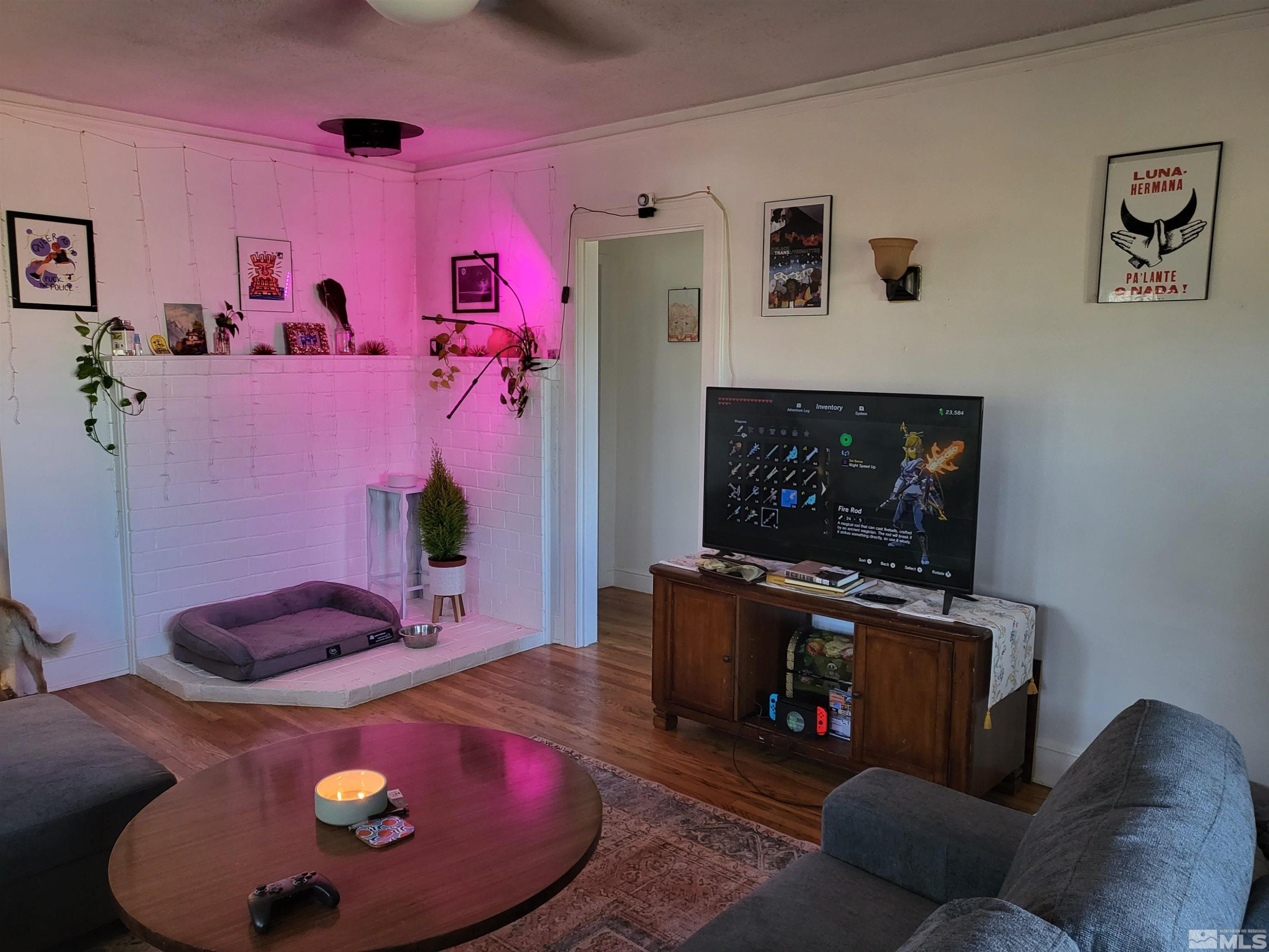 1347 Terrace Drive Reno, NV 89503 - Photo 3 of 25 a living room with furniture and a flat screen tv
