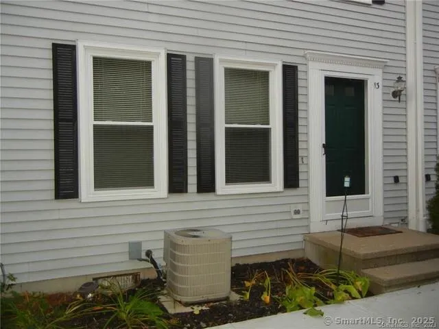 a front view of a house with a garage