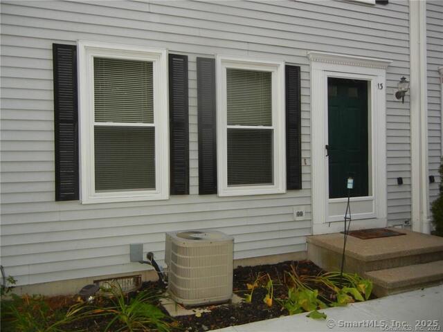a front view of a house with a garage