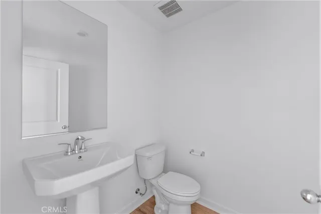 a bathroom with a sink and a toilet