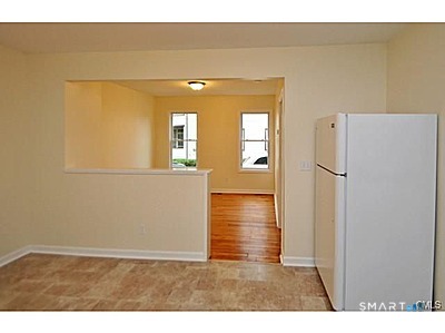 148 Alfred Street Bridgeport, CT 06605 - Photo 33 of 53 a view of hallway with wooden floor