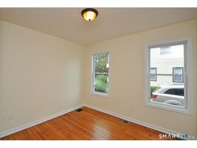 148 Alfred Street Bridgeport, CT 06605 - Photo 37 of 53 a view of empty room with window