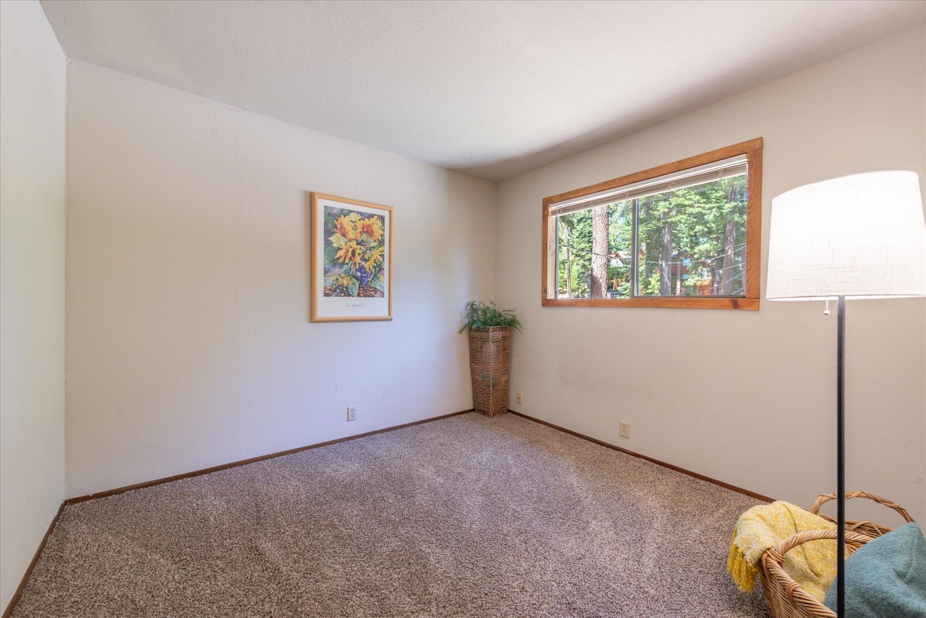 325 North Ridge Road Carnelian Bay, CA 96140 - Photo 19 of 22 a view of an empty room with a window