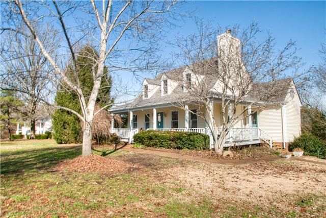 7358 Crow Cut Road Fairview, TN 37062 - Photo 1 of 18 a front view of a house with a yard