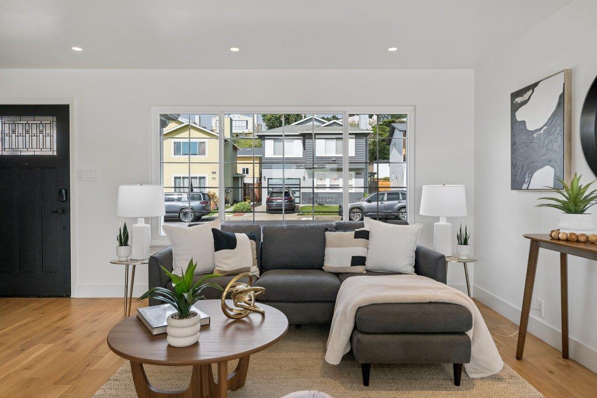 170 Beachview Avenue Pacifica, CA 94044 - Photo 36 of 85 a living room with furniture and a potted plant