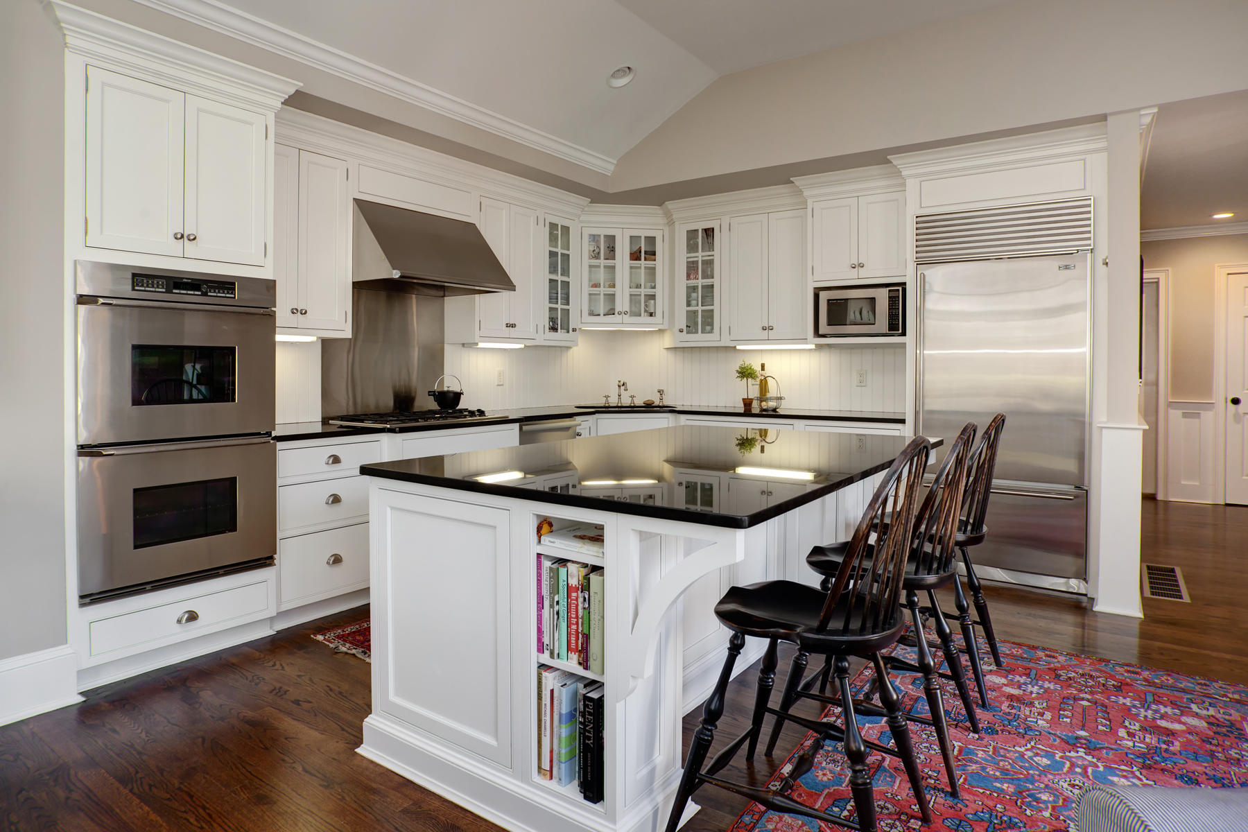 199 East Bay Road, Unit 12 Osterville, MA 02655 - Photo 13 of 40 a kitchen with a sink a microwave and cabinets