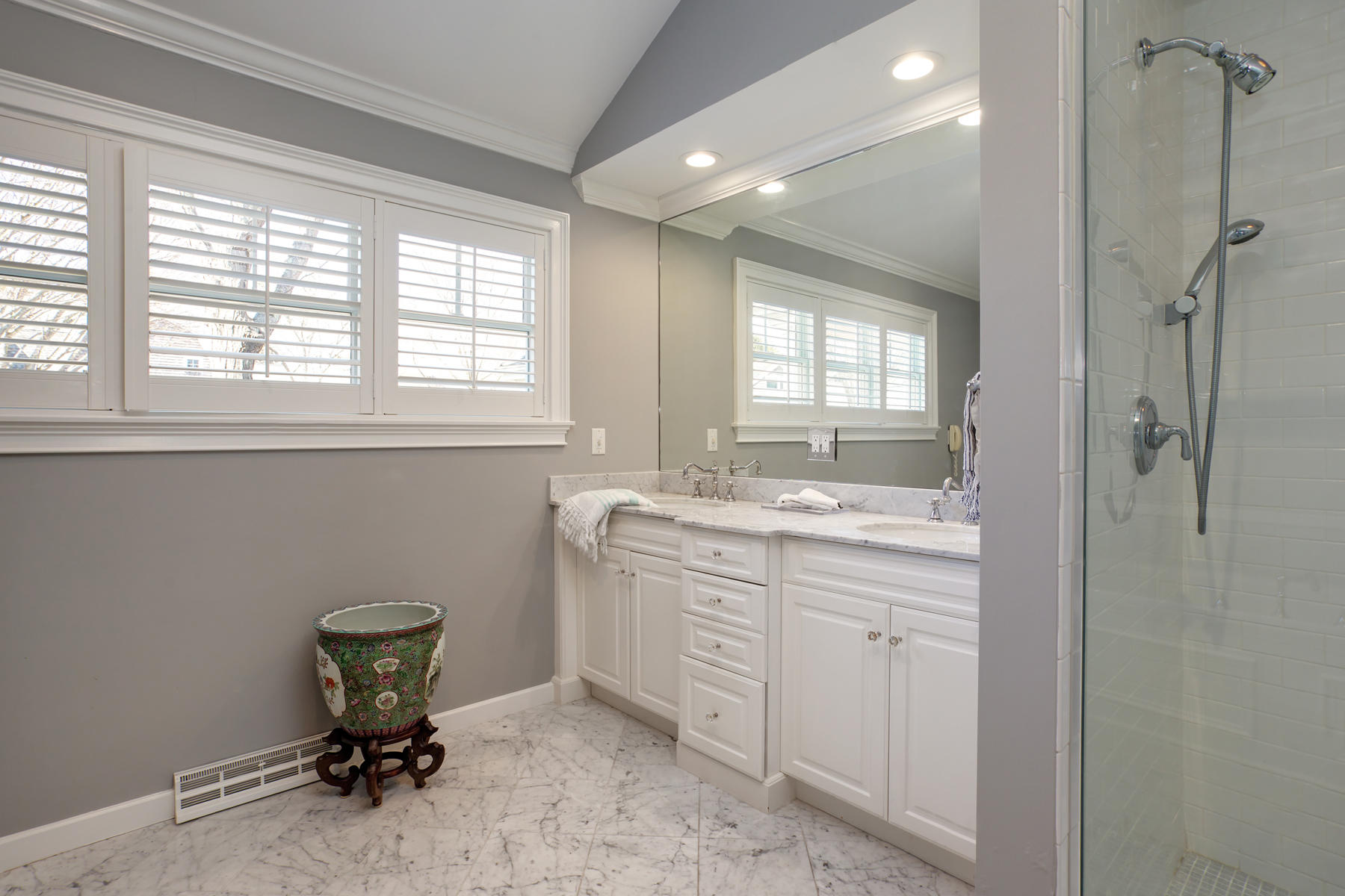 199 East Bay Road, Unit 12 Osterville, MA 02655 - Photo 18 of 40 a bathroom with a granite countertop sink a toilet and next to a window
