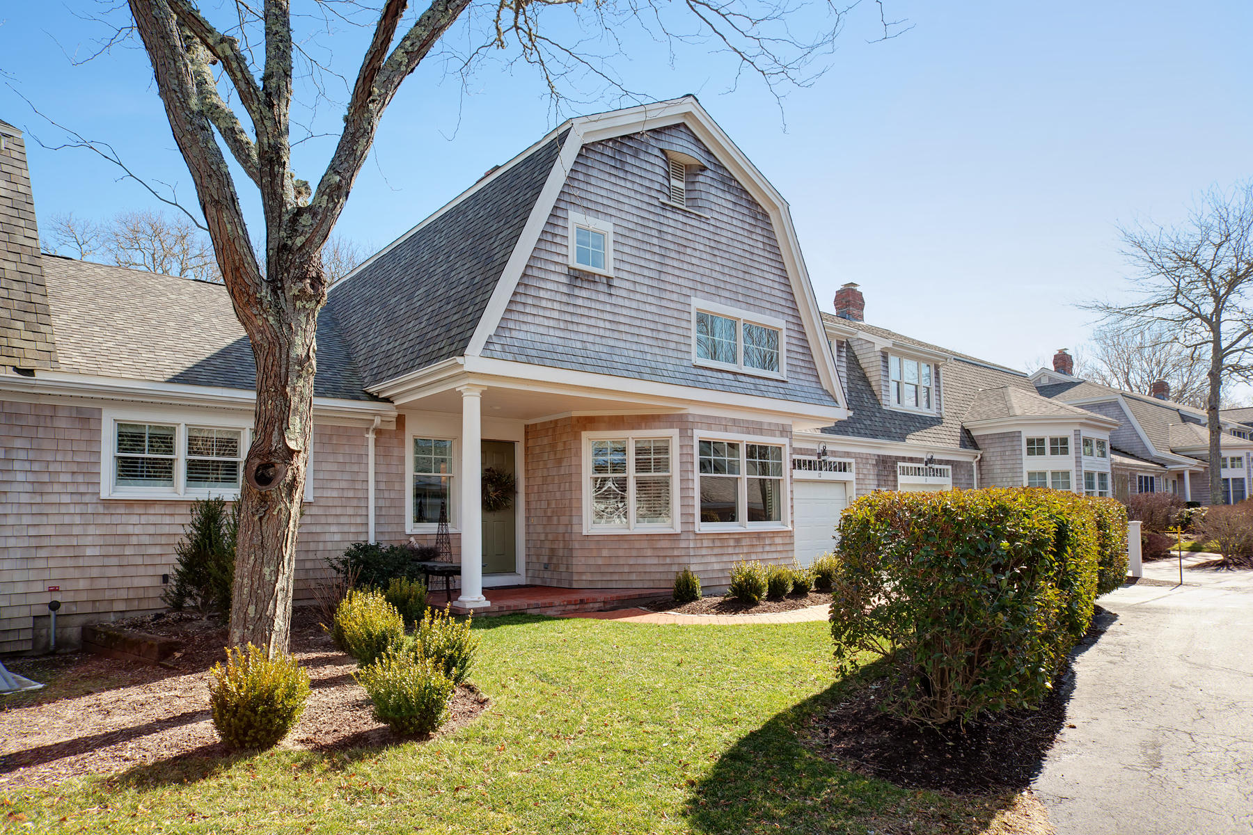 199 East Bay Road, Unit 12 Osterville, MA 02655 - Photo 2 of 40 a view of a house with a yard