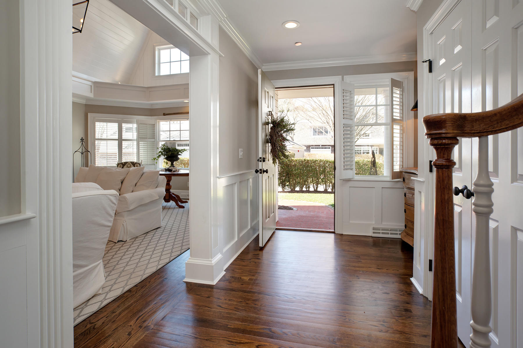 199 East Bay Road, Unit 12 Osterville, MA 02655 - Photo 3 of 40 a view of a hallway with wooden floor and windows
