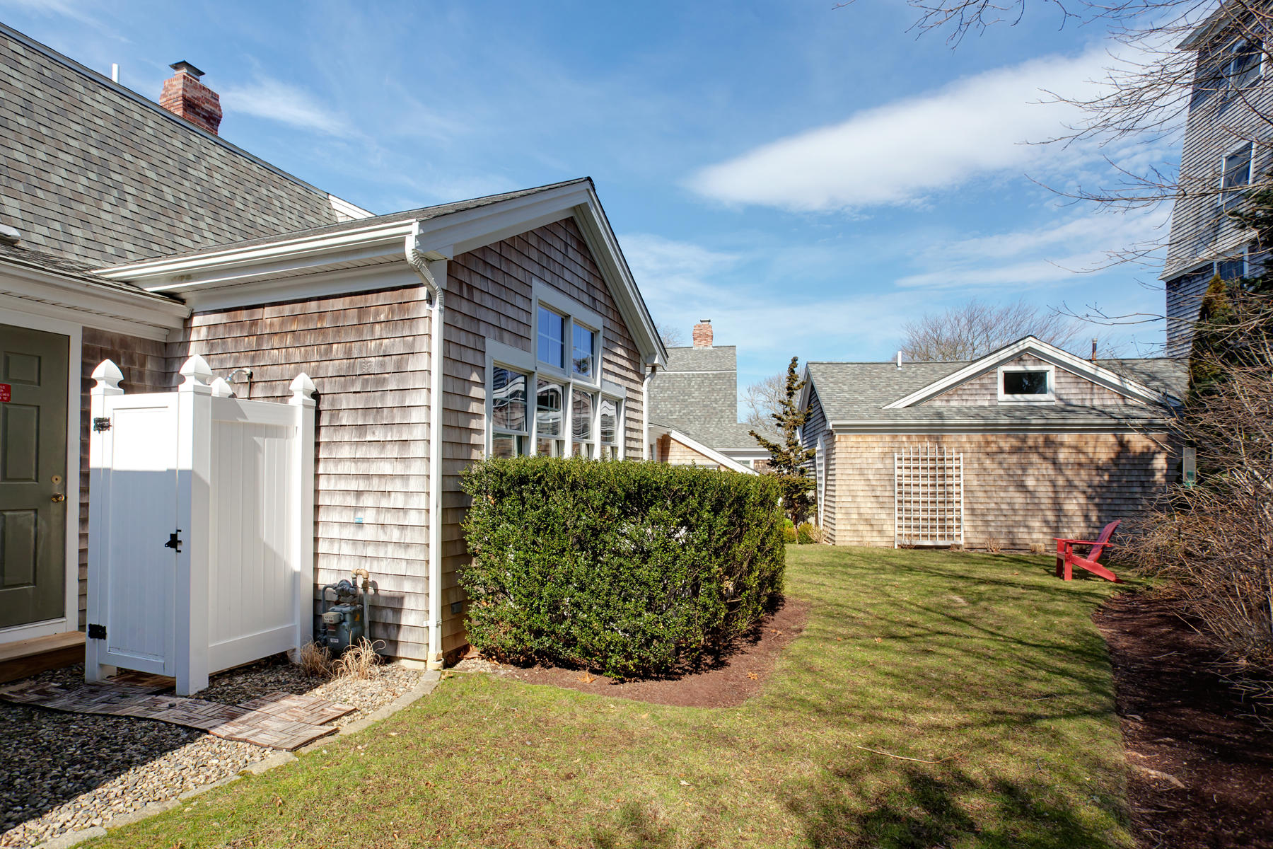 199 East Bay Road, Unit 12 Osterville, MA 02655 - Photo 37 of 40 a view of a house with a yard