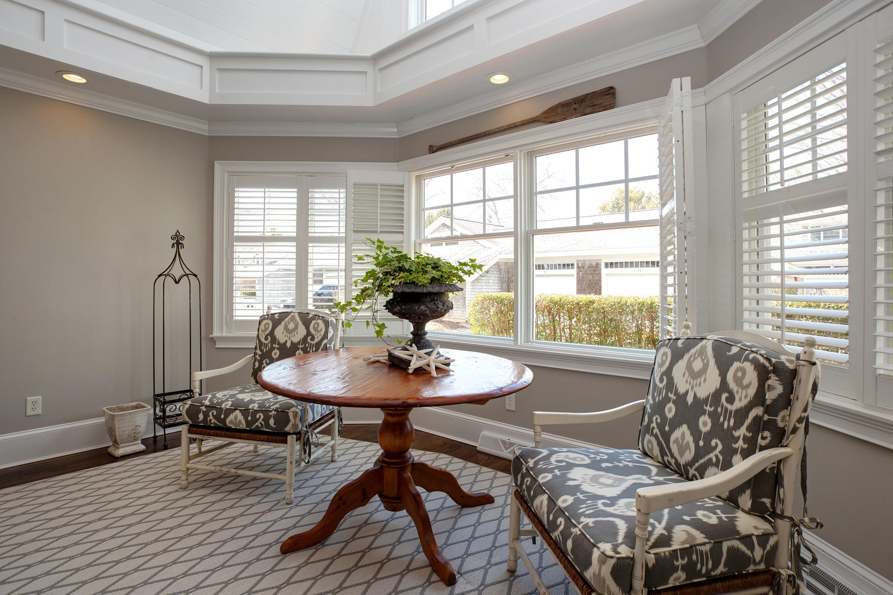 199 East Bay Road, Unit 12 Osterville, MA 02655 - Photo 5 of 40 a view of a dining room with furniture and wooden floor