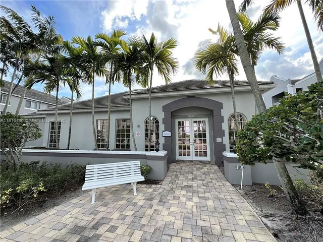 a front view of a house with a porch