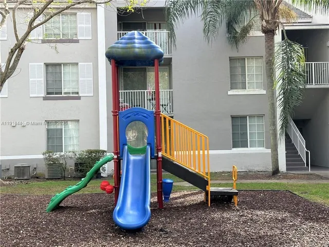 a view of a house with a park