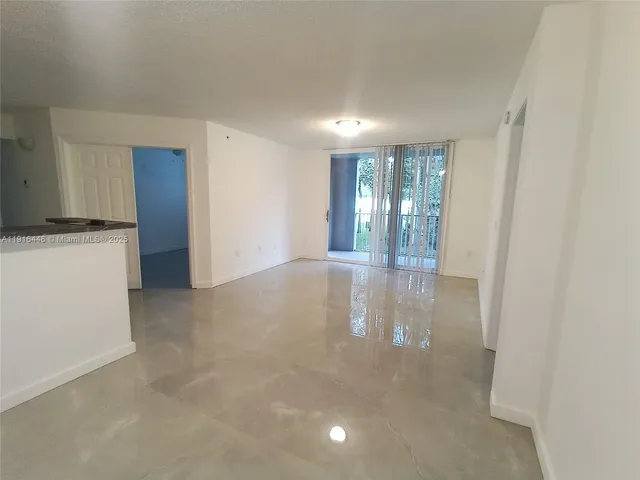 a view of livingroom with hardwood floor and hallway