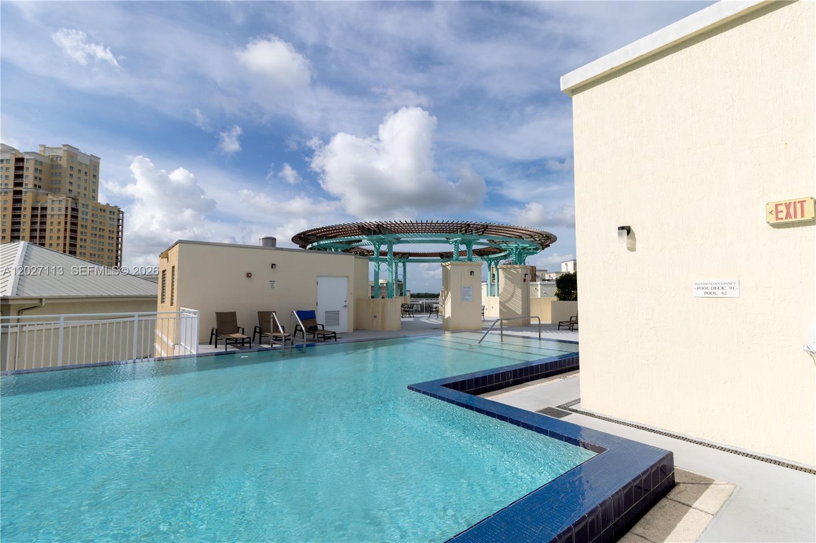 7275 Southwest 90th Way, Unit 213 Miami, FL 33156 - Photo 29 of 31 an outdoor space with garden view