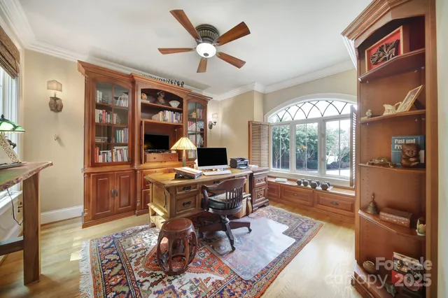 a spacious bathroom with a double vanity sink a mirror a bathtub and shower