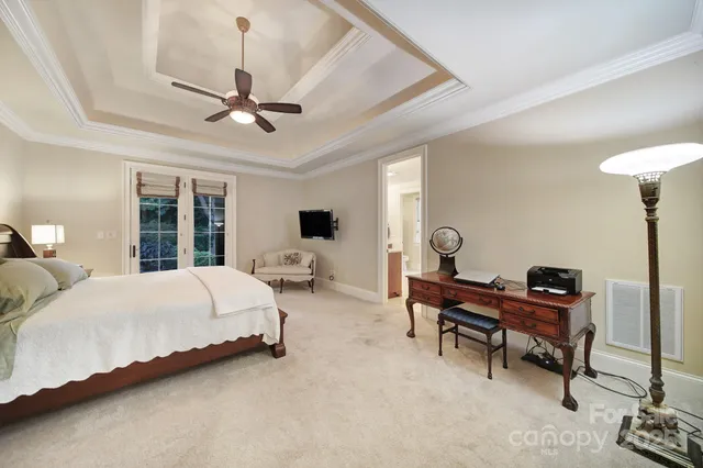 a bathroom with a sink vanity granite and a mirror