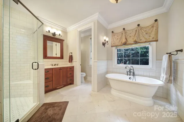 a view of a patio with a table and chairs next to a yard