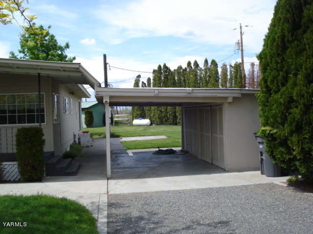 2512 Birchfield Road Yakima, WA 98901 - Photo 14 of 20 a view of a house with a yard